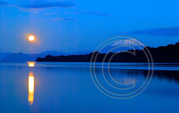 Chile  Moon rising over volcanos